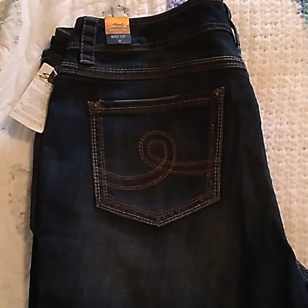 Dark wash blue jeans.